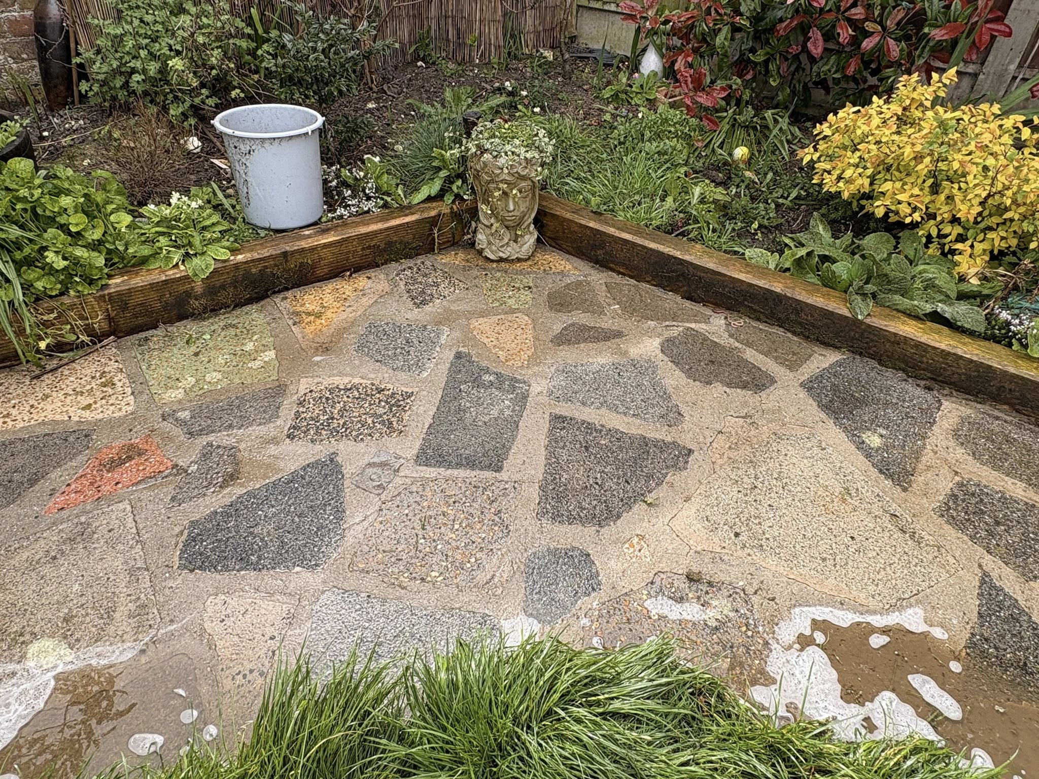 Garden patio area with decorative gravel pattern design