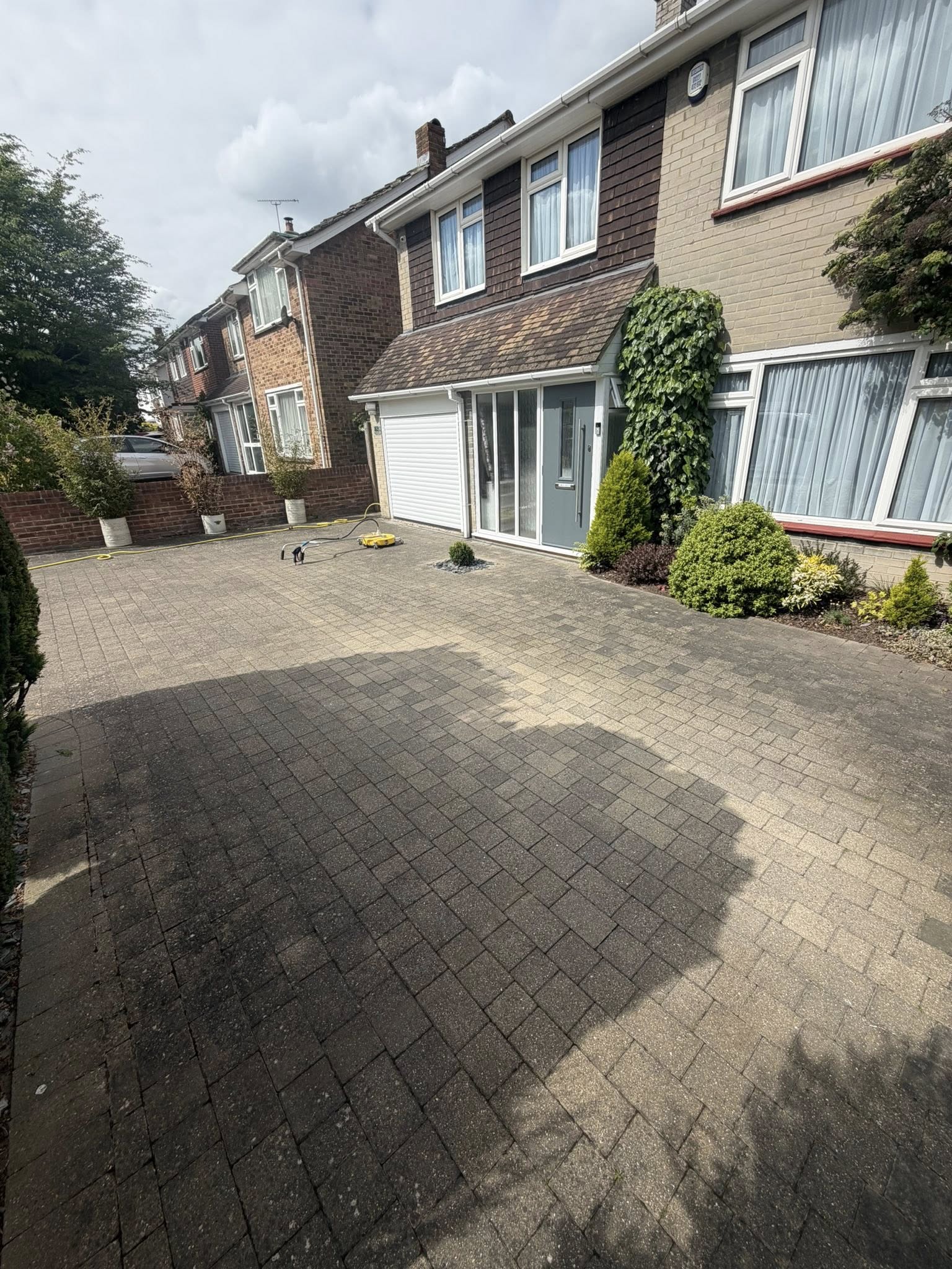 Clean driveway and house exterior