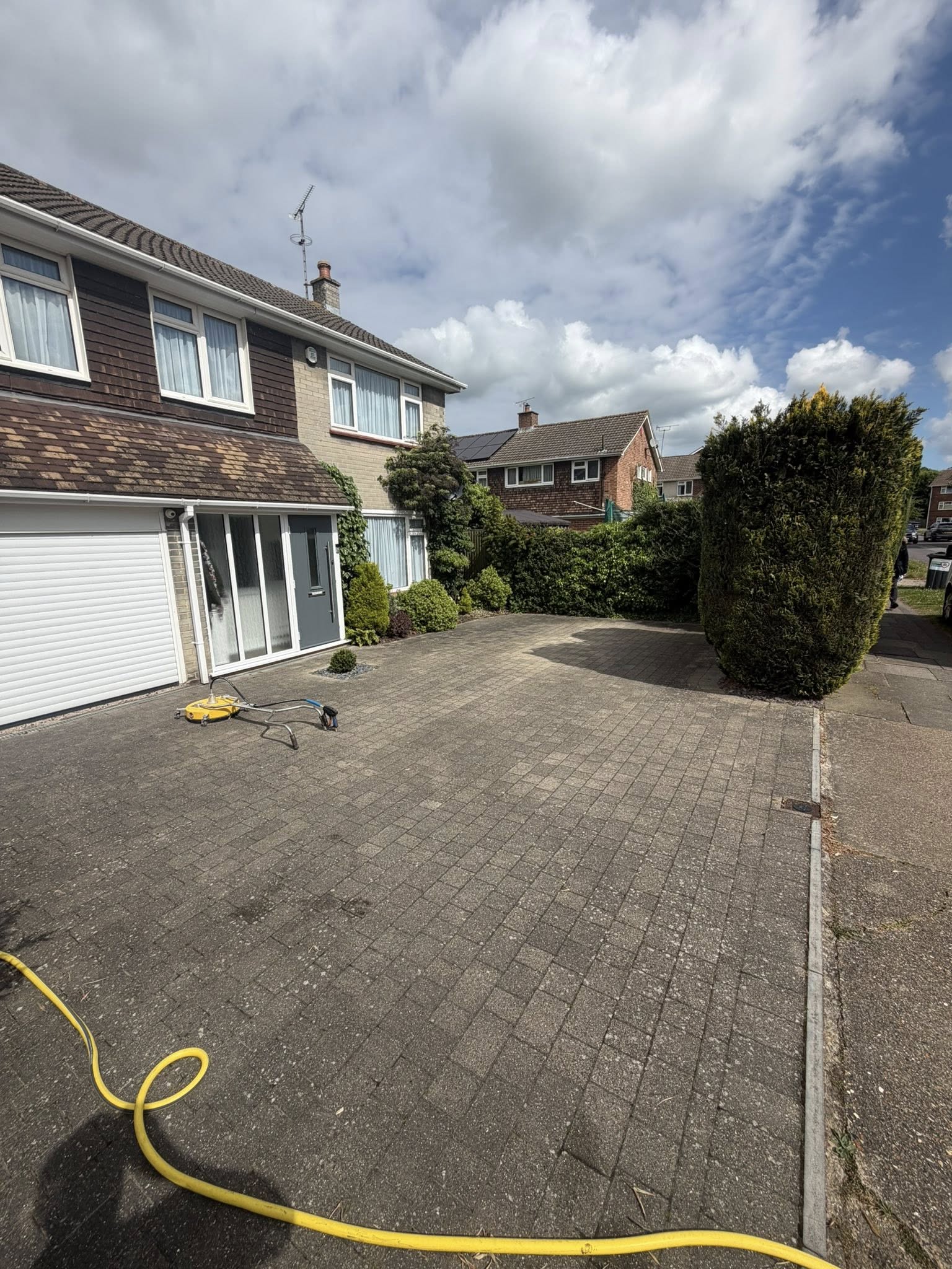 Driveway cleaning in progress